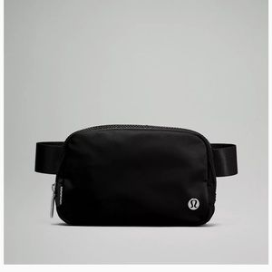 Brand new NEVER USED black lululemon Fanny pack, comes with tags